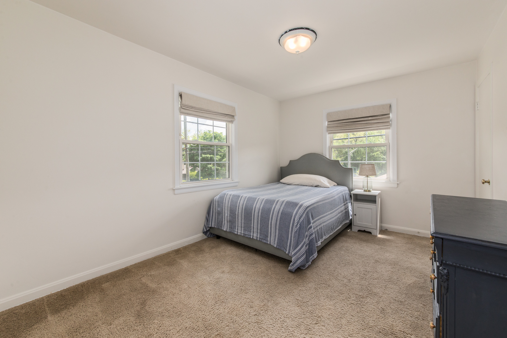 1116 South Aldine Avenue Park Ridge, IL 60068 - Photo 17 of 31 a bedroom with a bed and window