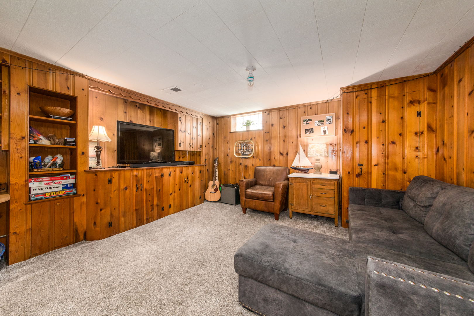 1116 South Aldine Avenue Park Ridge, IL 60068 - Photo 20 of 31 a living room with furniture and a flat screen tv