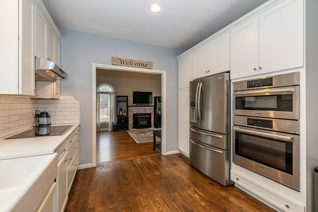 142 River Road Pepperell, MA 01463 - Photo 17 of 41 a kitchen with a refrigerator stove and sink