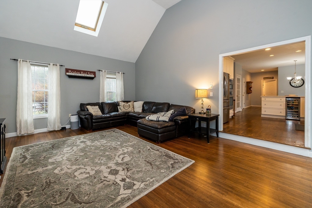 142 River Road Pepperell, MA 01463 - Photo 18 of 41 a living room with furniture and a wooden floor