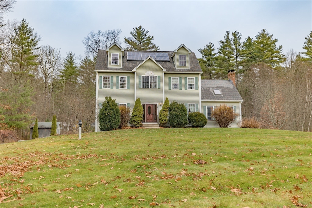 142 River Road Pepperell, MA 01463 - Photo 2 of 41 a front view of a house with a yard