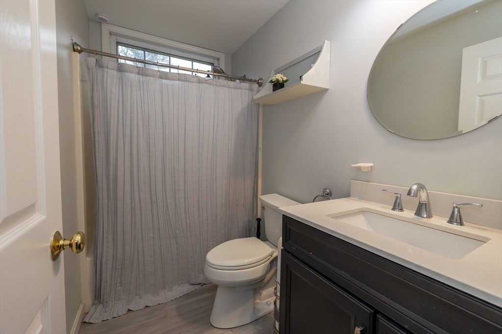 142 River Road Pepperell, MA 01463 - Photo 32 of 41 a bathroom with a sink a toilet and shower