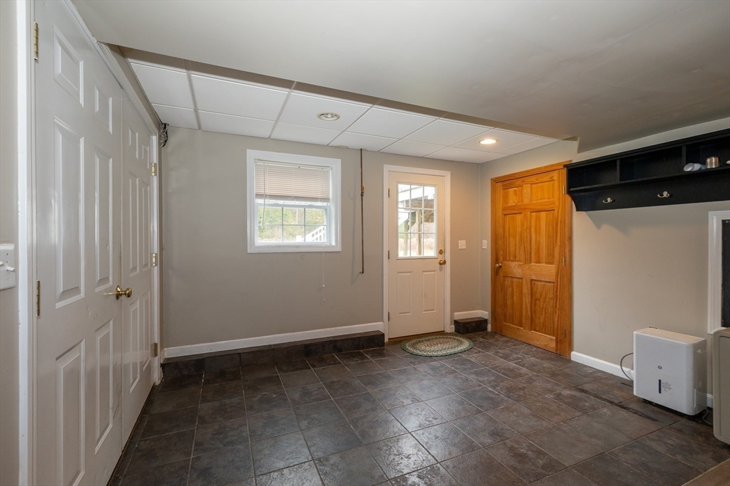 142 River Road Pepperell, MA 01463 - Photo 36 of 41 a view of an empty room with a window