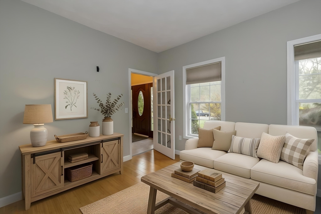 142 River Road Pepperell, MA 01463 - Photo 9 of 41 a living room with furniture and a window