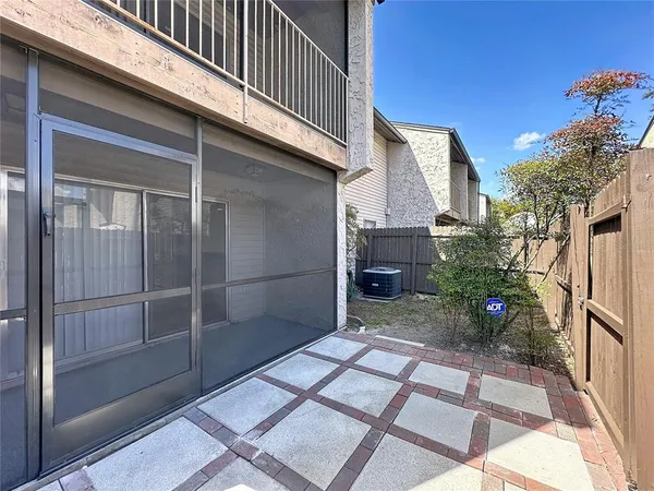 a view of a back yard of the house