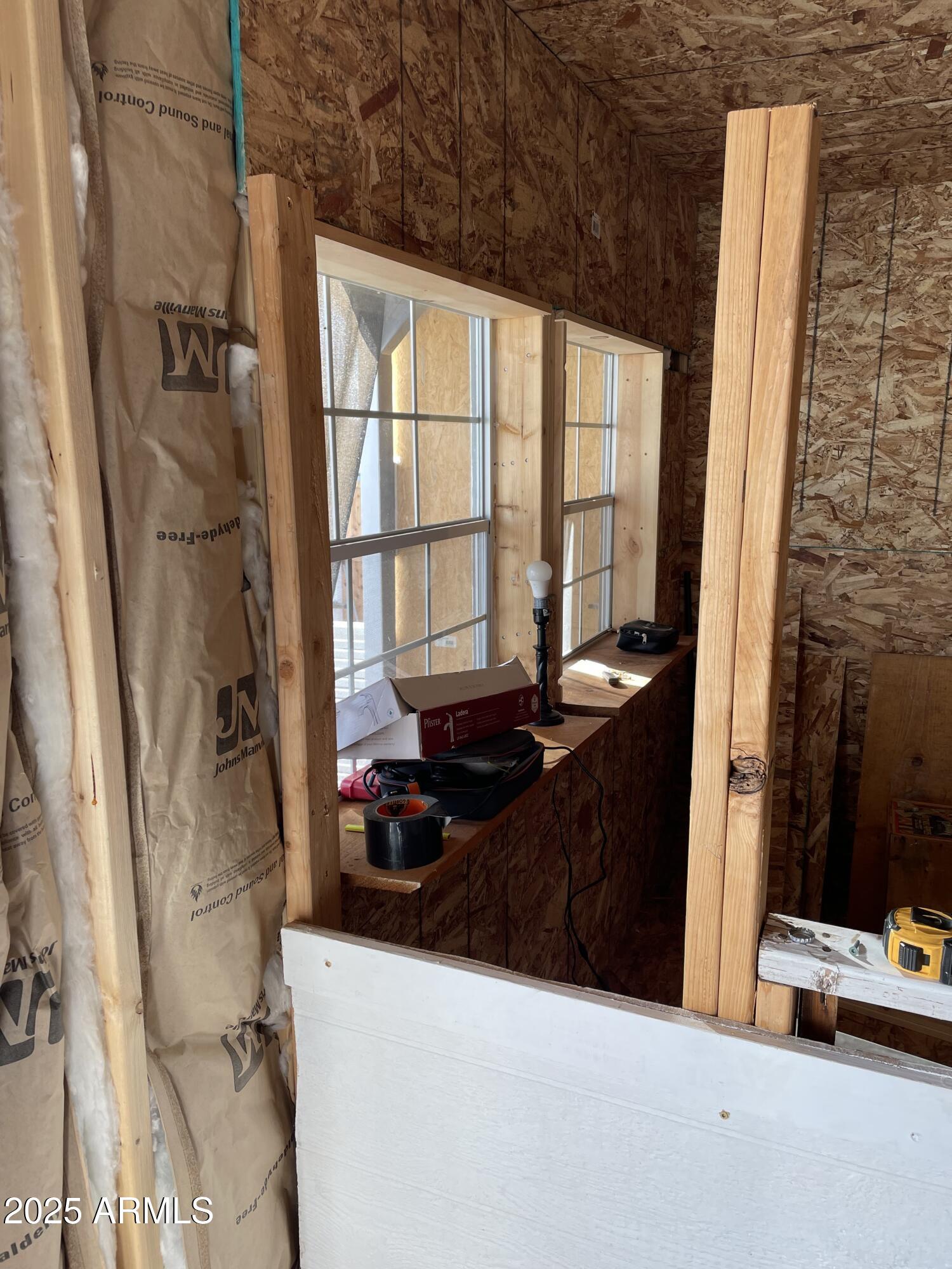 0 Th Buckeye, AZ 85326 - Photo 2 of 6 a bedroom with a bed and a window