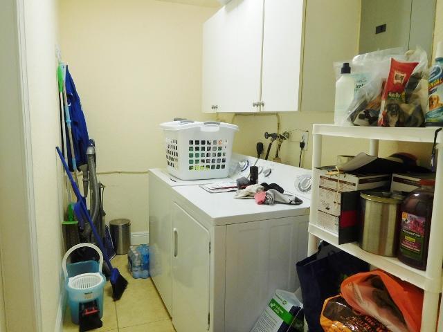6797 Northeast 7th Avenue Boca Raton, FL 33487 - Photo 14 of 21 a utility room with dryer and washer