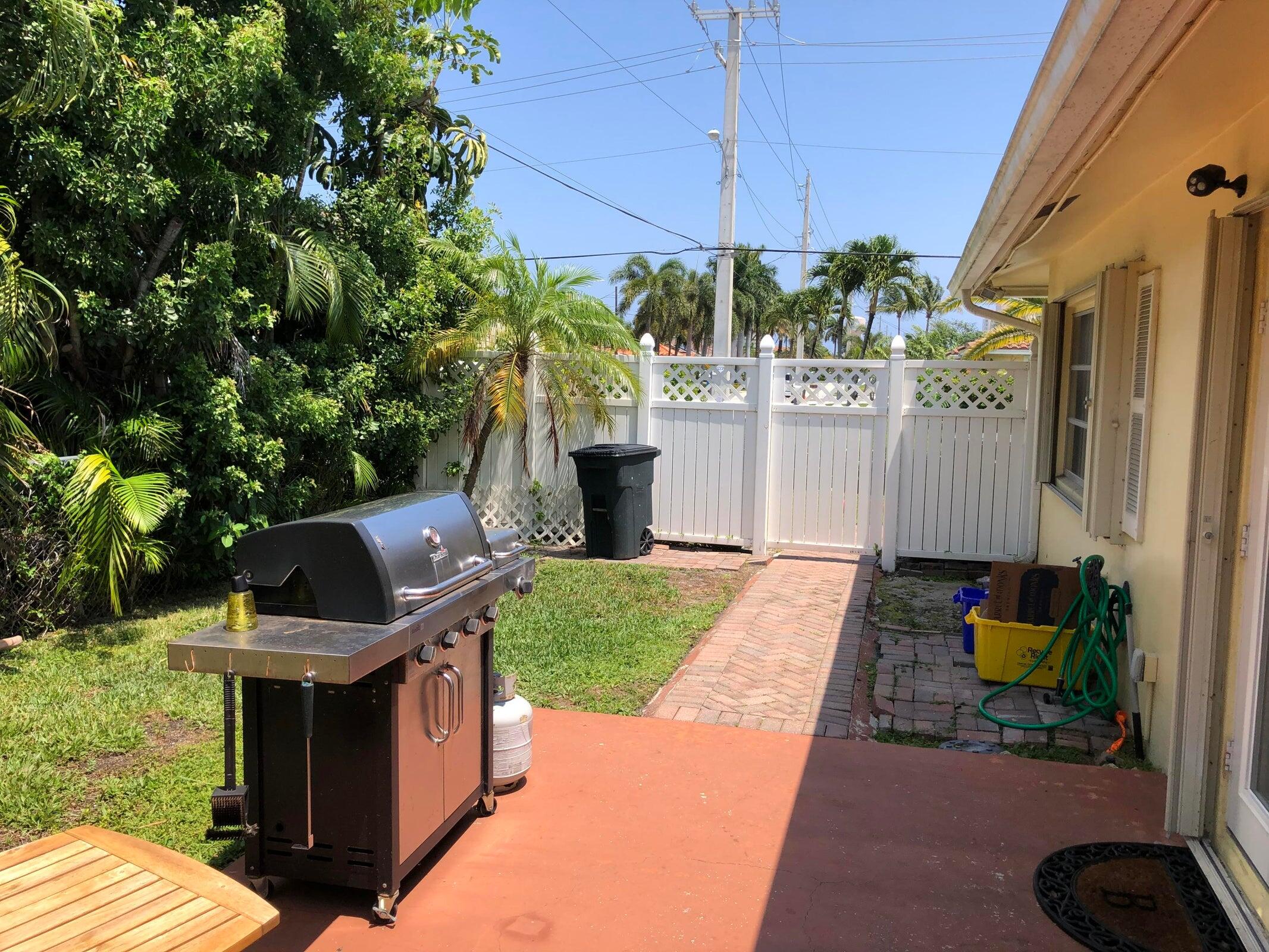 6797 Northeast 7th Avenue Boca Raton, FL 33487 - Photo 18 of 21 a view of outdoor space and yard