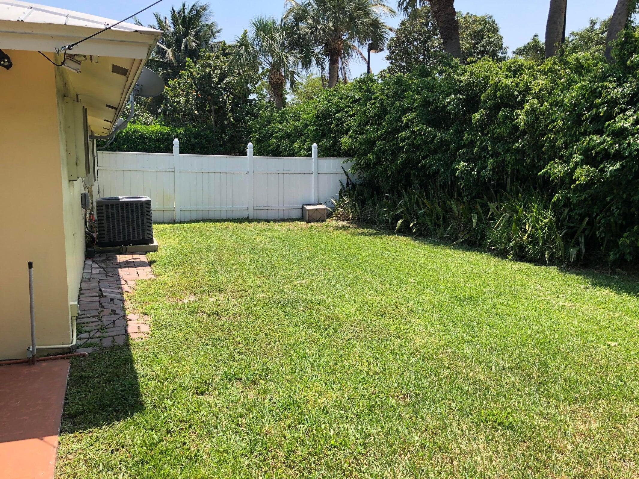 6797 Northeast 7th Avenue Boca Raton, FL 33487 - Photo 19 of 21 a view of a backyard