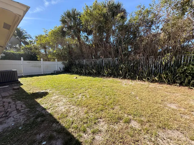 a view of a swimming pool with an outdoor space