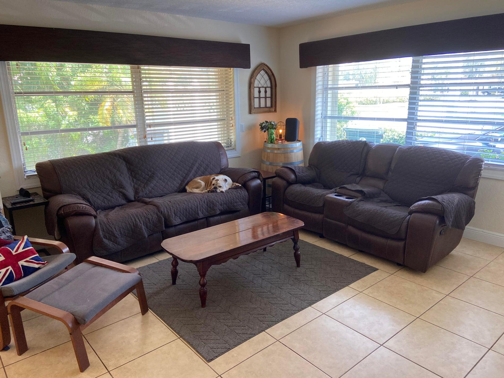 6797 Northeast 7th Avenue Boca Raton, FL 33487 - Photo 4 of 21 a living room with furniture and a window
