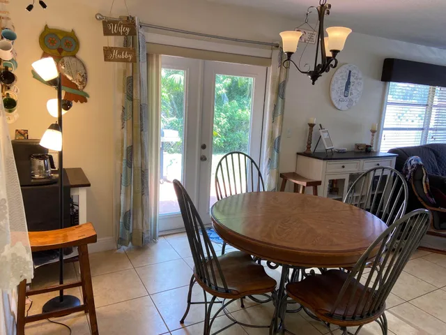 a kitchen with stainless steel appliances granite countertop a stove and a microwave