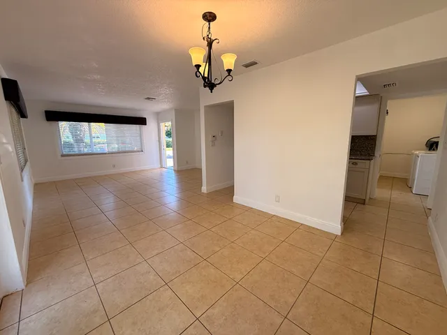 a view of livingroom with furniture and window