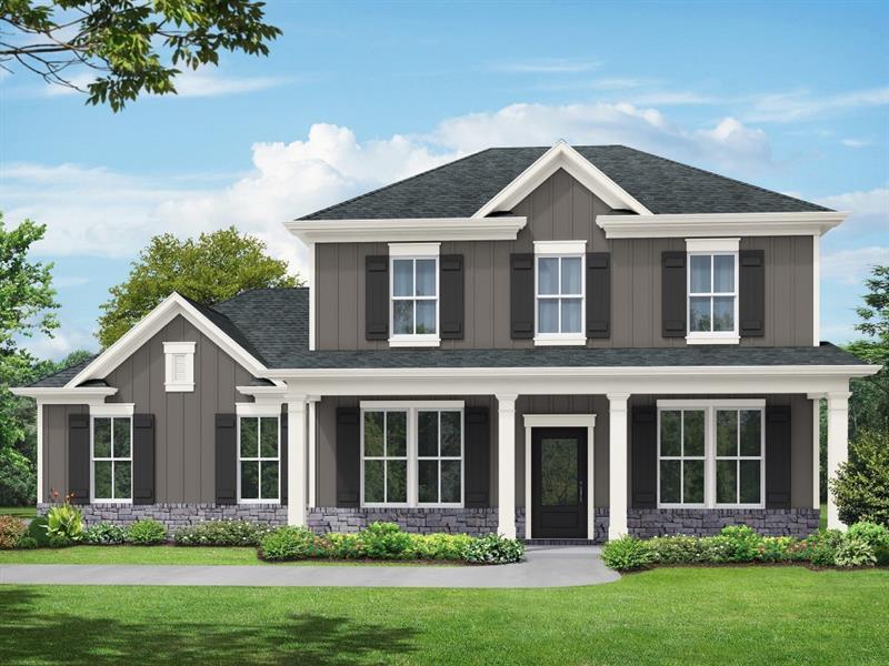 front view of a house with a yard