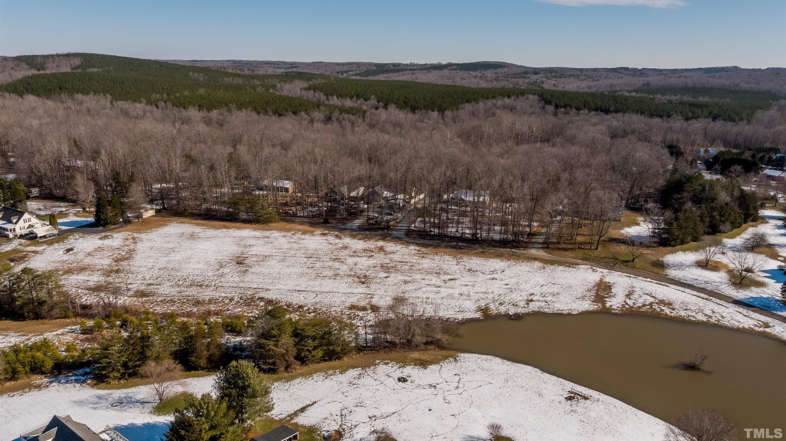 7-8 Stoney Mountain Road Rougemont, NC 27572 - Photo 16 of 31 a view of a lake with a mountain