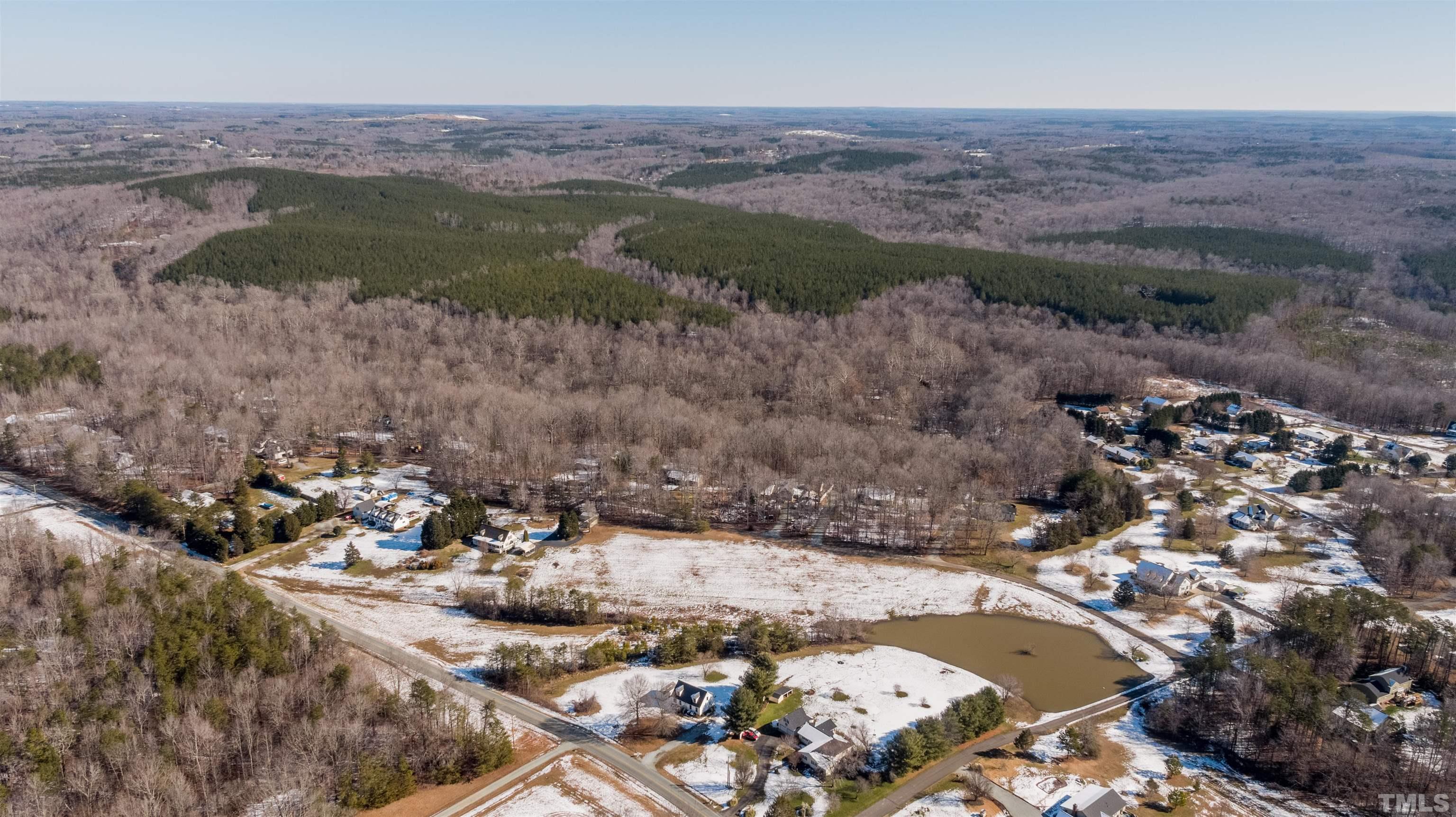7-8 Stoney Mountain Road Rougemont, NC 27572 - Photo 22 of 31 a view of a lake with mountains in the background