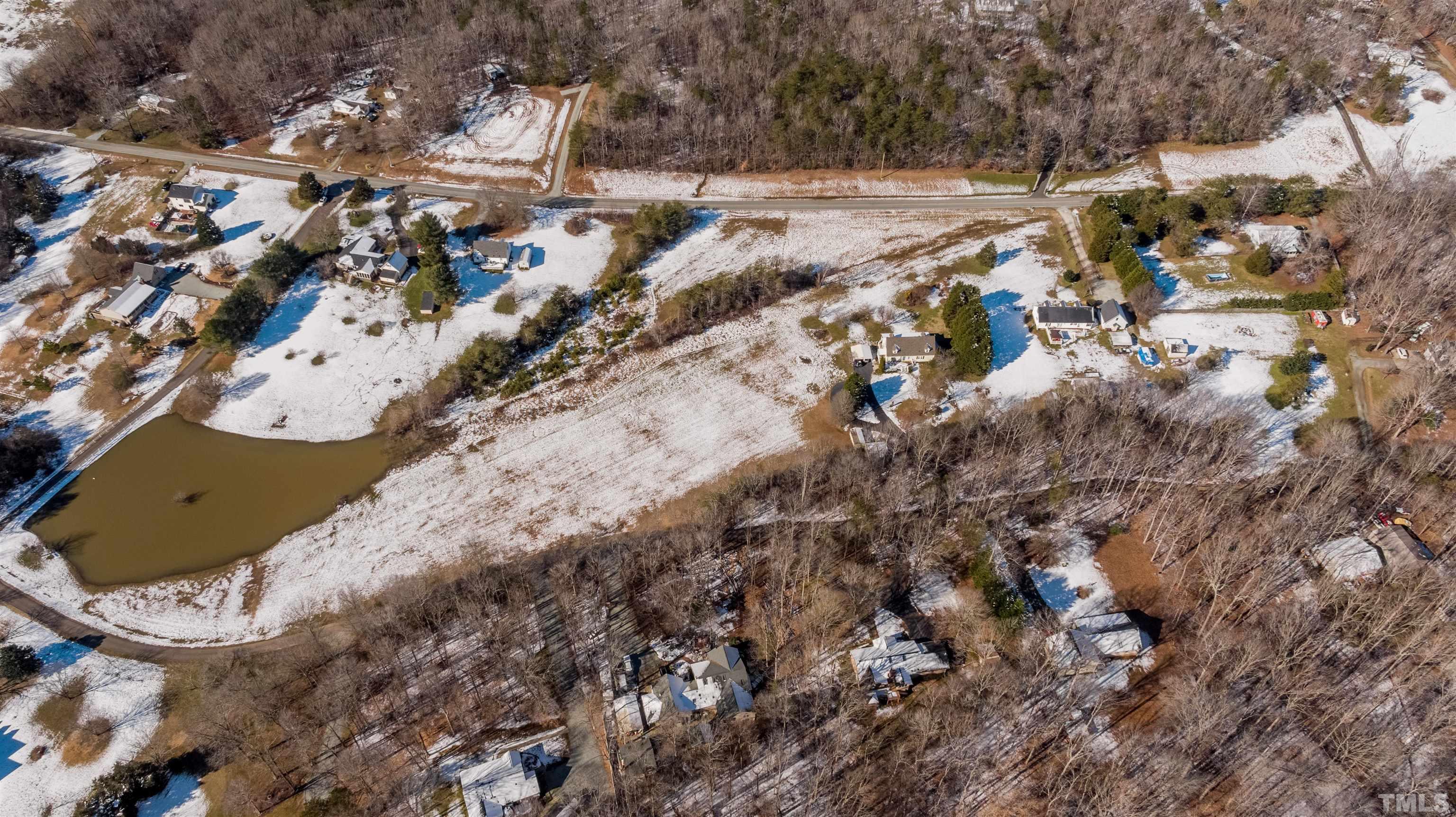 7-8 Stoney Mountain Road Rougemont, NC 27572 - Photo 28 of 31 an aerial view of residential houses with outdoor space