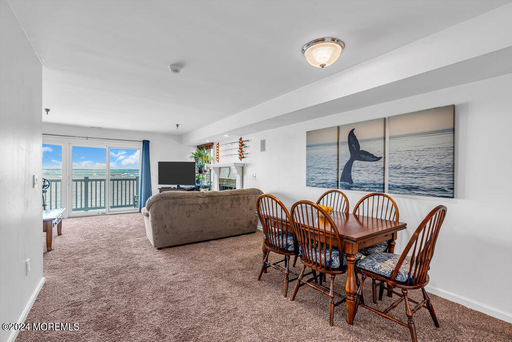 135 1st Street, Unit 2F Keyport, NJ 07735 - Photo 14 of 46 a dining room with furniture and window