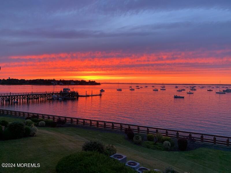 135 1st Street, Unit 2F Keyport, NJ 07735 - Photo 2 of 46 a view of a lake and sunset