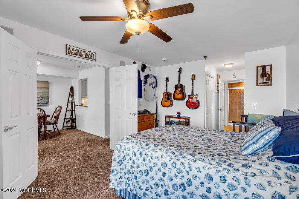 135 1st Street, Unit 2F Keyport, NJ 07735 - Photo 26 of 46 a bedroom with a bed and a walk in closet