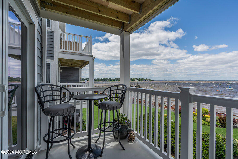 135 1st Street, Unit 2F Keyport, NJ 07735 - Photo 35 of 46 a view of a balcony with chairs