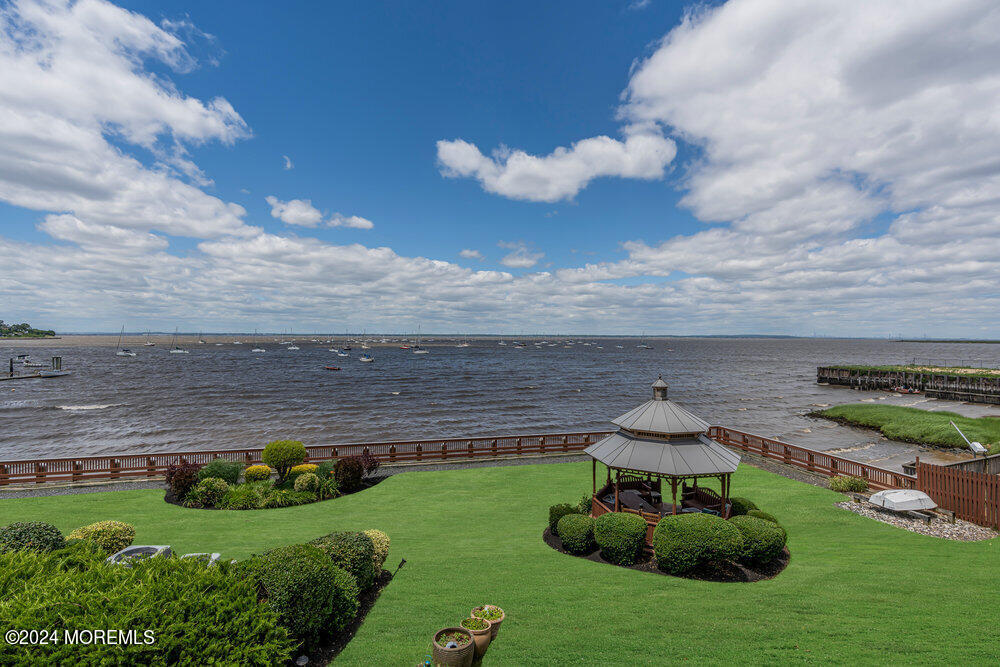135 1st Street, Unit 2F Keyport, NJ 07735 - Photo 36 of 46 a view of a backyard with plants