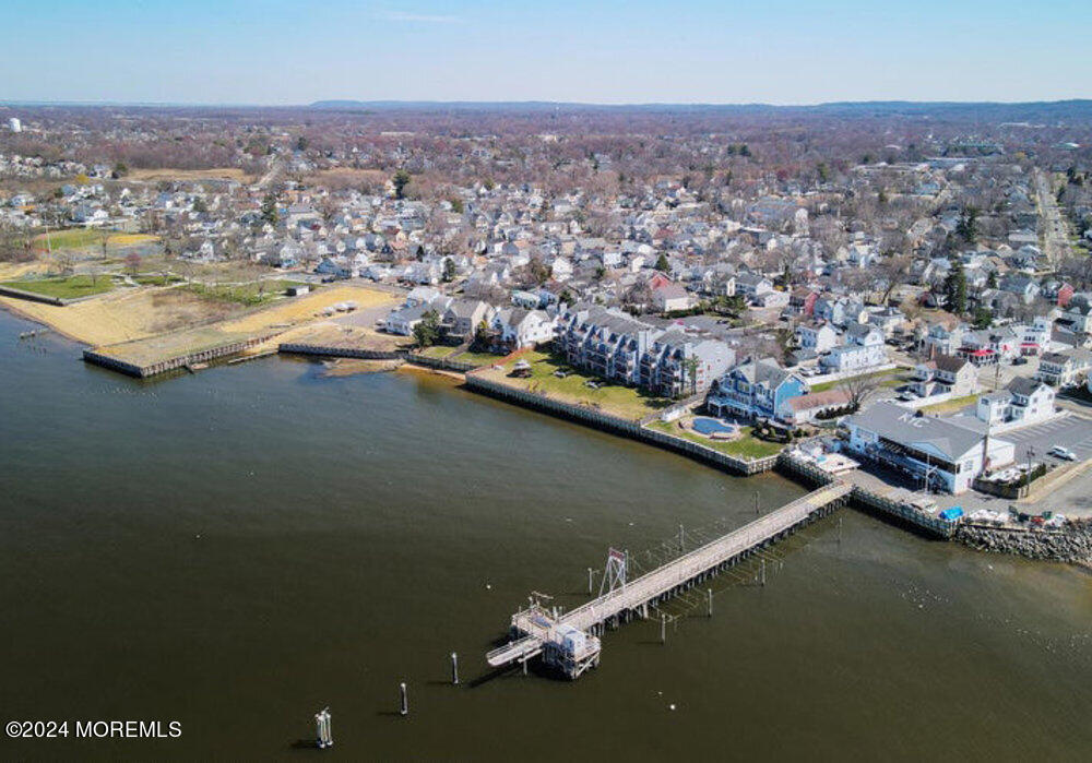 135 1st Street, Unit 2F Keyport, NJ 07735 - Photo 4 of 46 an aerial view of a house with a ocean view