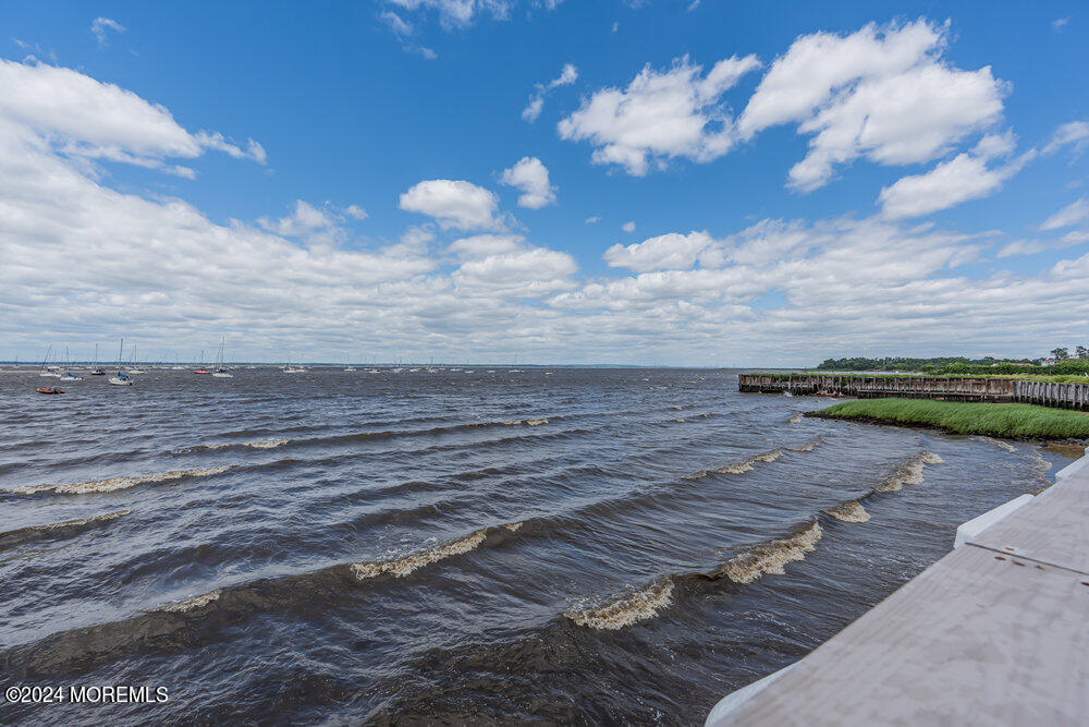 135 1st Street, Unit 2F Keyport, NJ 07735 - Photo 44 of 46 a view of a dry yard with wooden fence