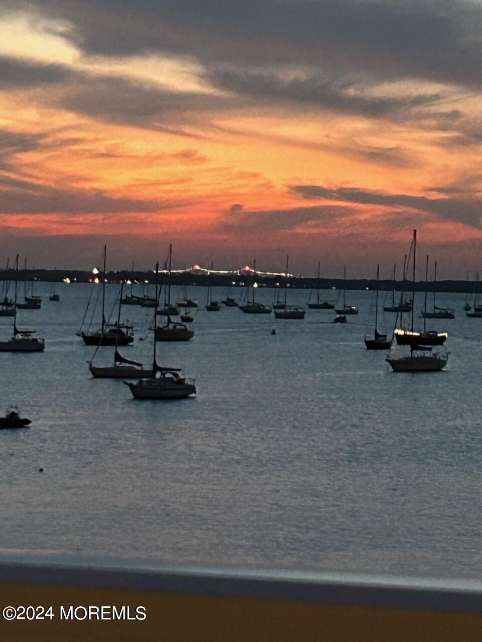 135 1st Street, Unit 2F Keyport, NJ 07735 - Photo 5 of 46 a view of car parked on road with city view