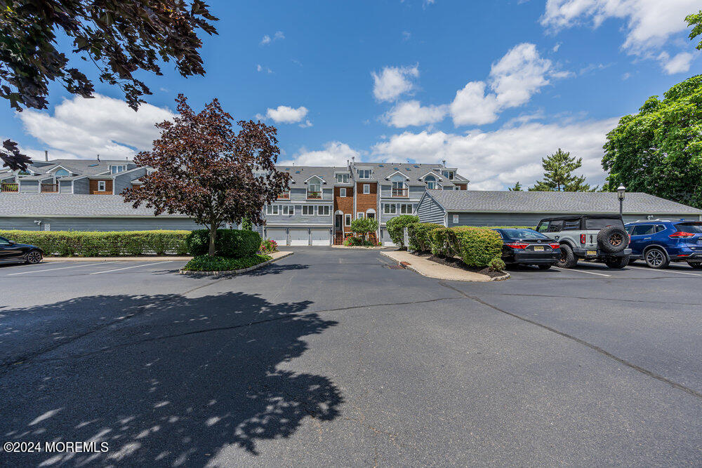 135 1st Street, Unit 2F Keyport, NJ 07735 - Photo 8 of 46 a car parked in front of a building