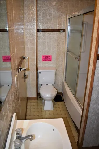 a bathroom with a sink and a shower
