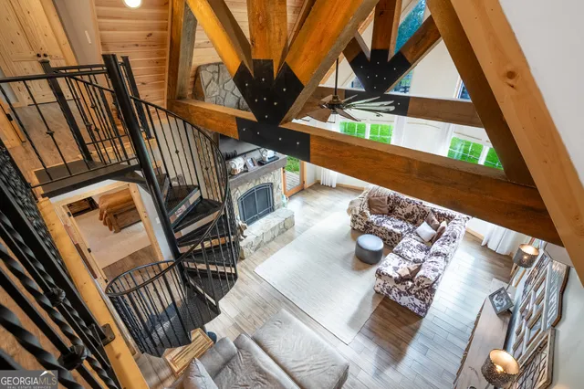 a view of an chairs and table in the balcony