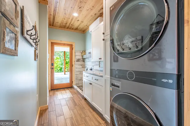 a view of washer and dryer in a bathroom