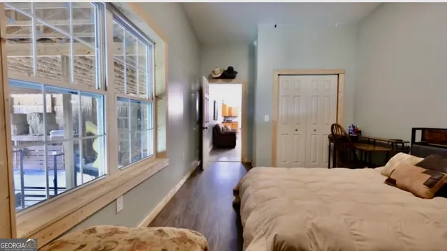 a view of entryway with wooden walls