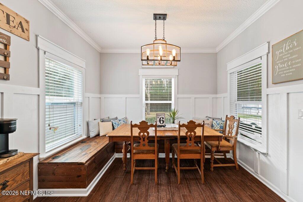 81015 Lockhaven Drive Yulee, FL 32097 - Photo 18 of 55 a view of a dining room with furniture window and wooden floor