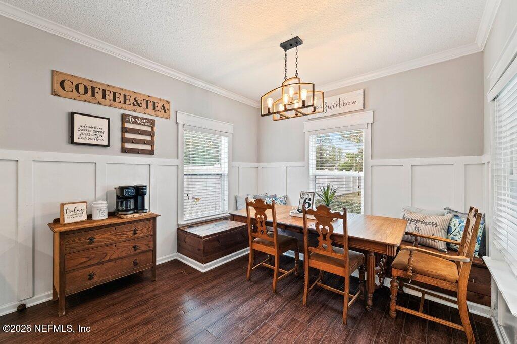 81015 Lockhaven Drive Yulee, FL 32097 - Photo 19 of 55 a view of a dining room with furniture wooden floor and a chandelier