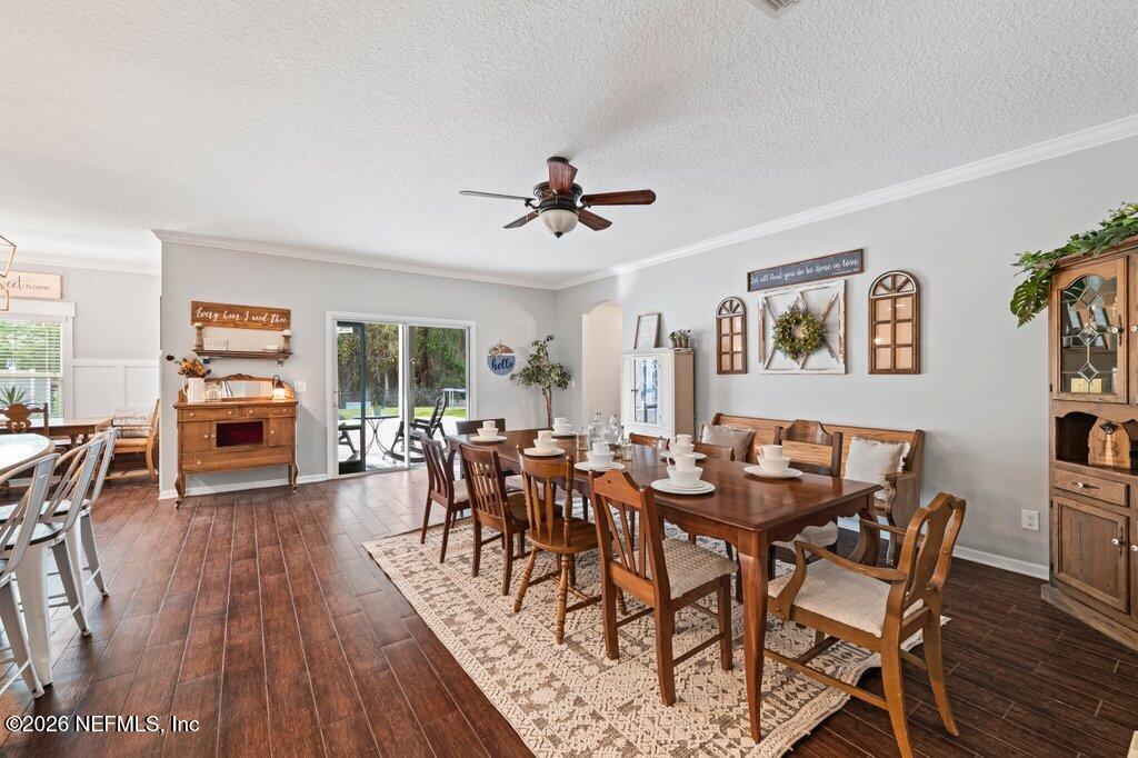 81015 Lockhaven Drive Yulee, FL 32097 - Photo 21 of 55 a view of a dining room with furniture and wooden floor