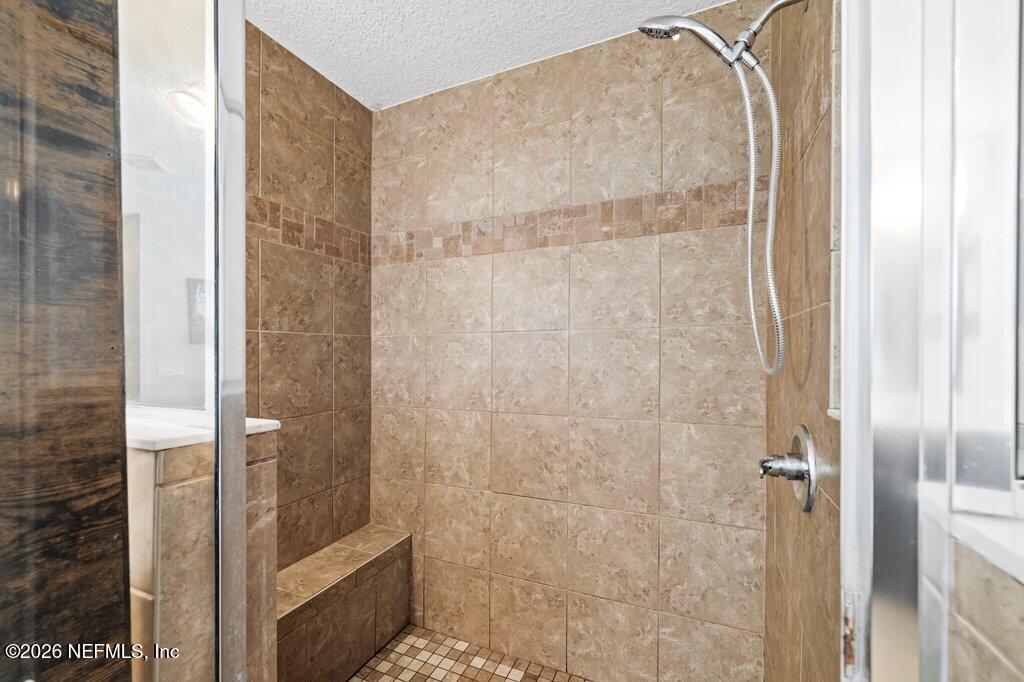 81015 Lockhaven Drive Yulee, FL 32097 - Photo 32 of 55 a bathroom with a shower