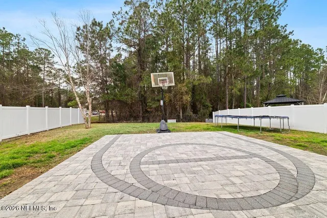 a view of a sign board with a big yard