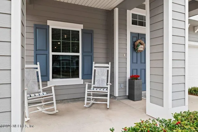 a house with a bench in front of it