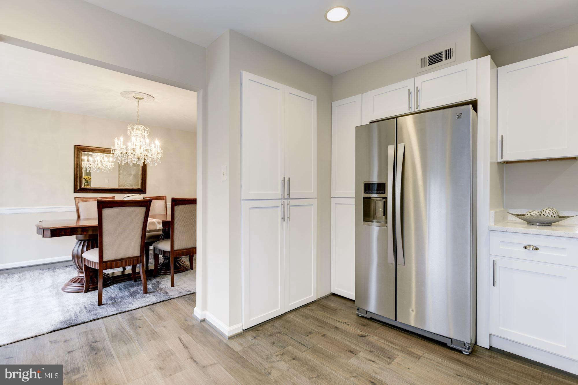 12352 Lima Lane Reston, VA 20191 - Photo 8 of 26 Kitchen Opens to Dining Room
