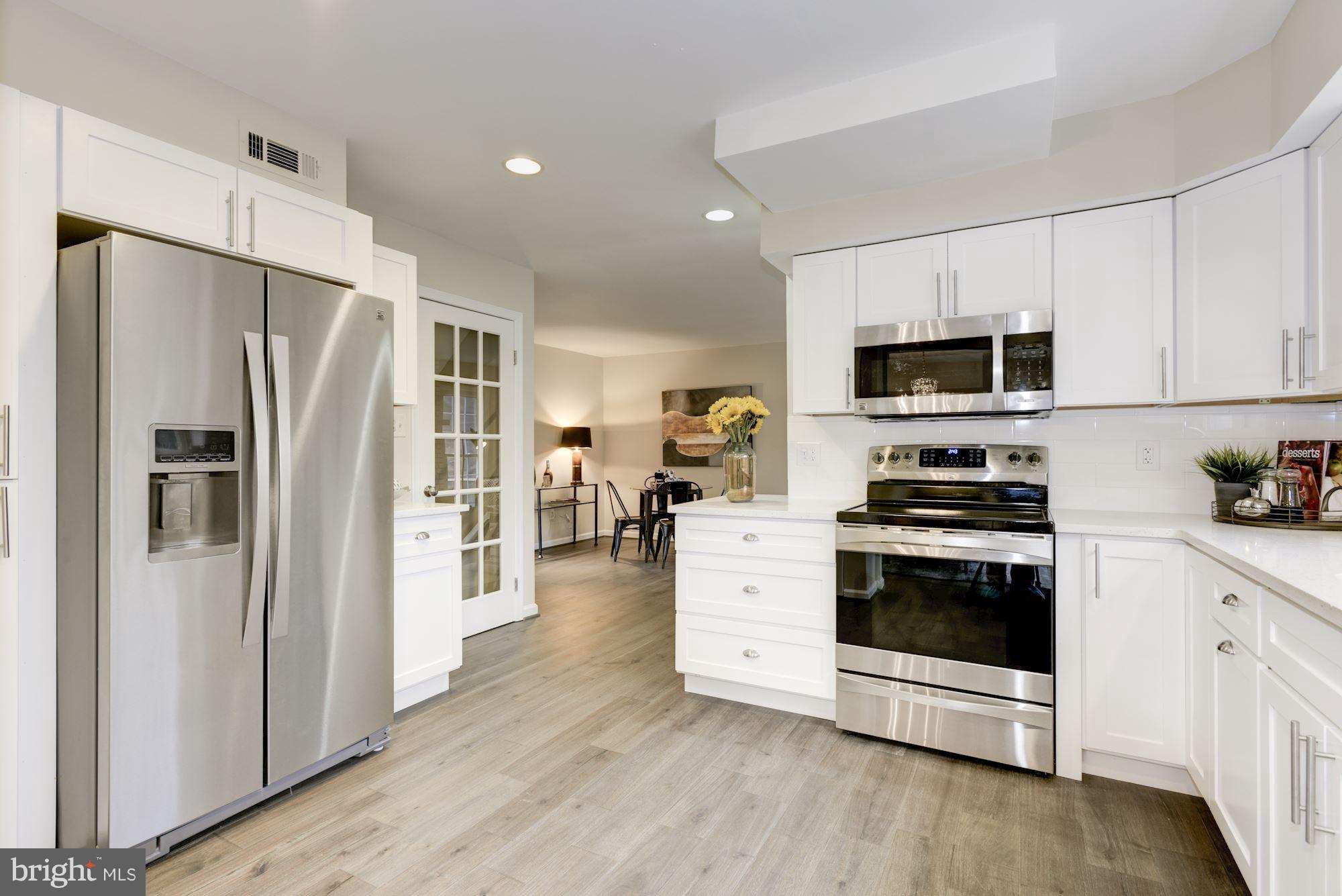 12352 Lima Lane Reston, VA 20191 - Photo 9 of 26 Kitchen Opens to Family Room