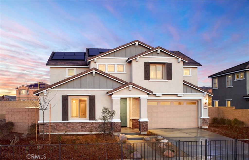 4635 Stratford Place Perris, CA 92571 - Photo 1 of 16 a front view of a house with a yard