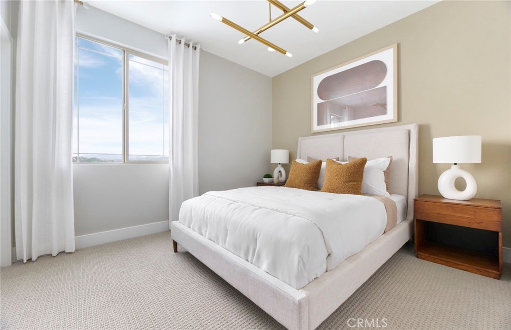 4635 Stratford Place Perris, CA 92571 - Photo 14 of 16 a bedroom with a bed and painting on the wall