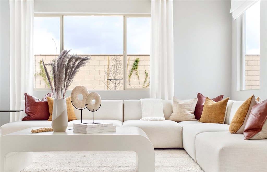 4635 Stratford Place Perris, CA 92571 - Photo 6 of 16 a living room with furniture and a large window
