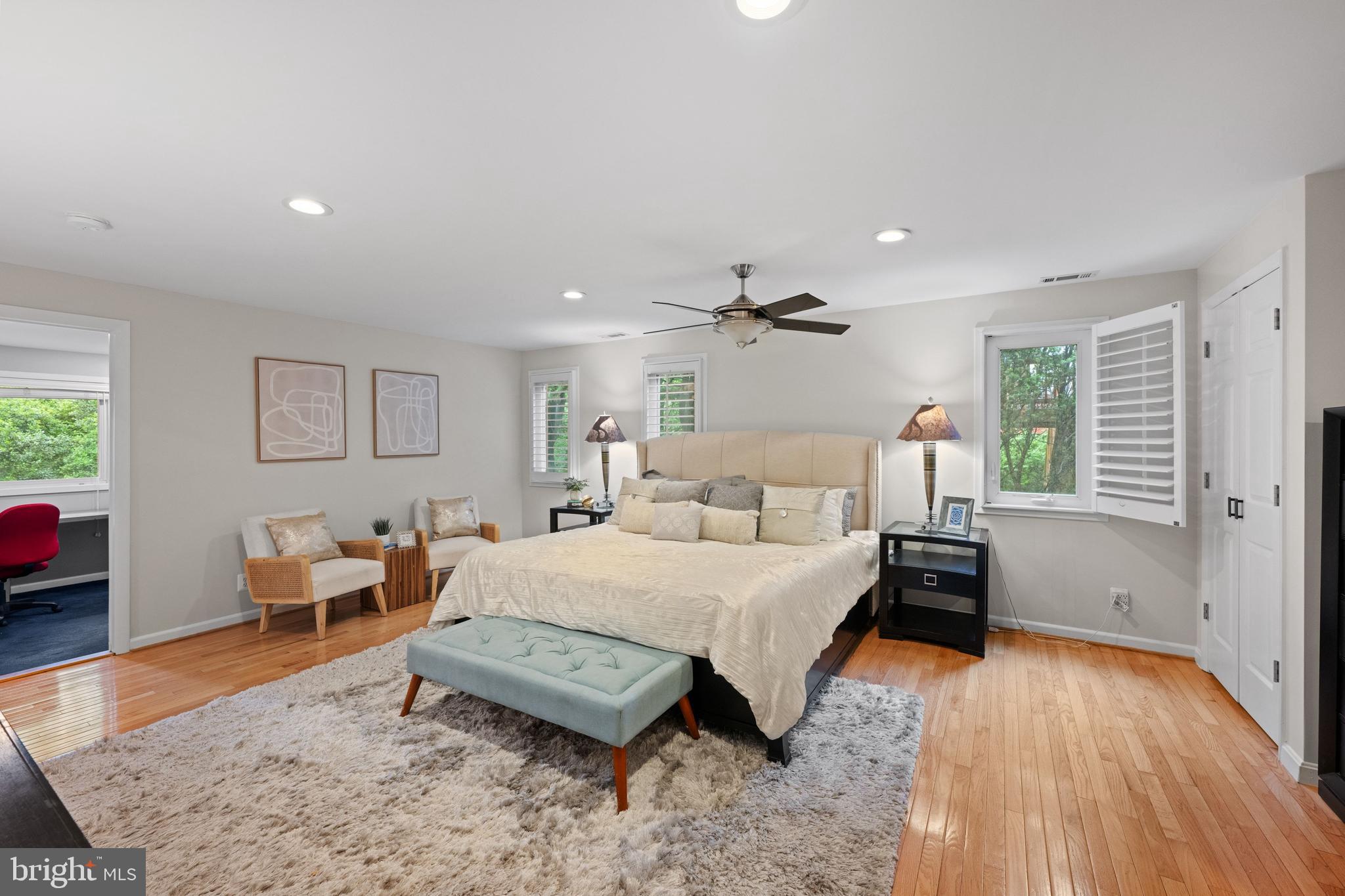 3529 Yuma Street Northwest Washington, DC 20008 - Photo 23 of 46 a bedroom with a bed a couch and dresser