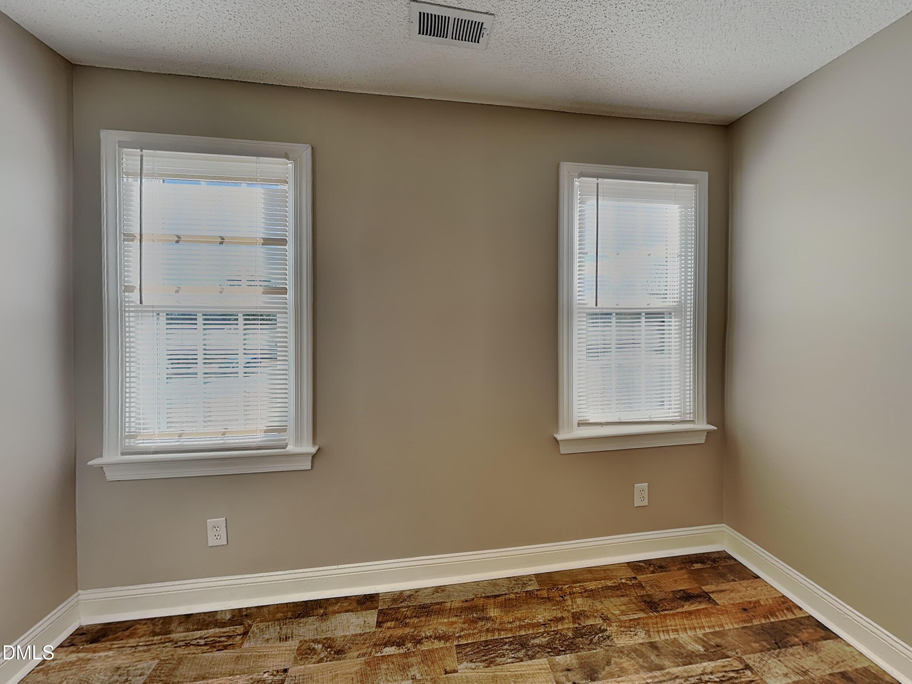622 Commander Drive Wendell, NC 27591 - Photo 12 of 16 an empty room with a window