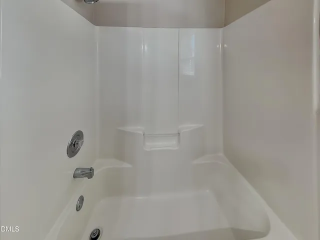 a close up of a bathtub