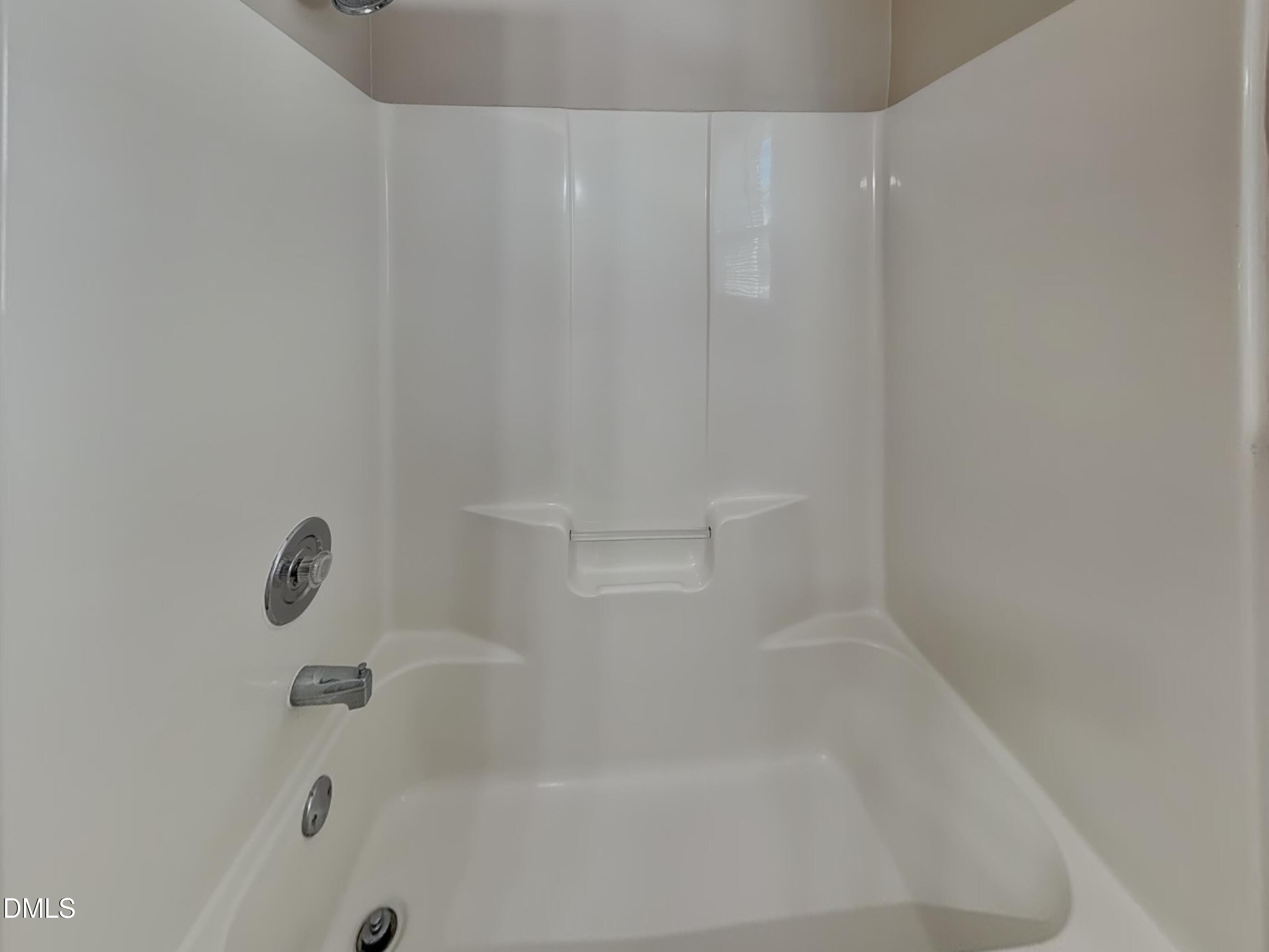 622 Commander Drive Wendell, NC 27591 - Photo 14 of 16 a close up of a bathtub