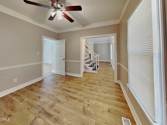 a view of a livingroom with a flat screen tv